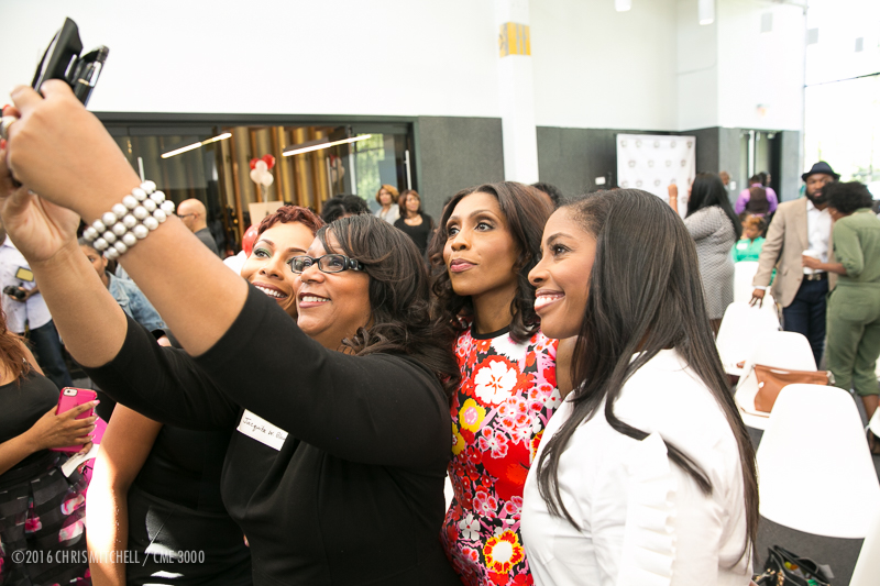 A guest takes selfie with Genise Shelton - Dr. Jackie - Dr. Simone